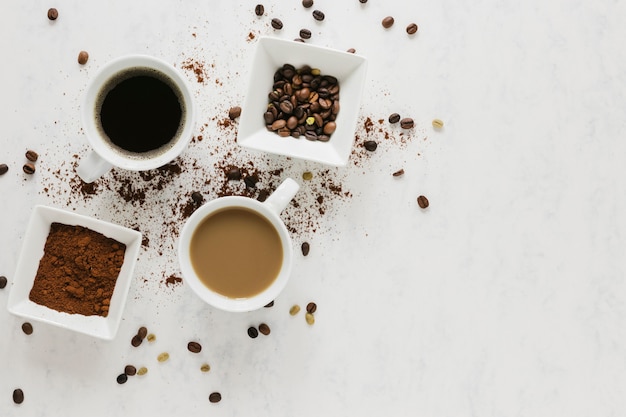 Flat lay of warm coffee cups