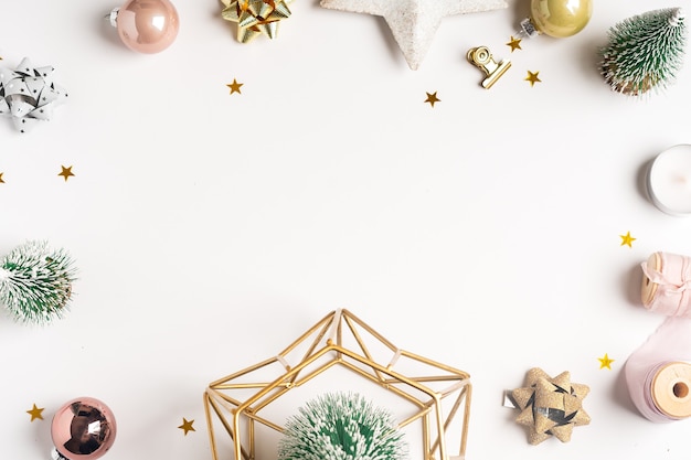 Flat lay of white working table background with Christmas decoration