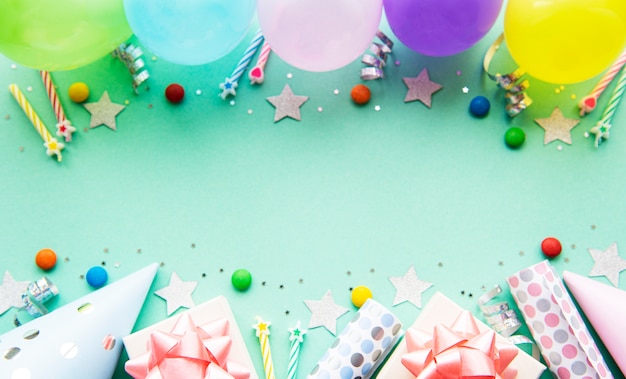 Flat Lay with birthday balloons, confetti and ribbons