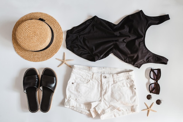 Flat lay with clothes fashion summer concept