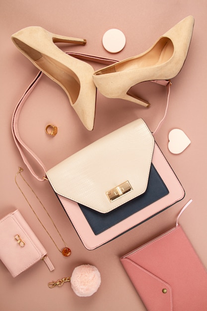 Flat lay with Elegant woman accessories, hand bag and high heel shoes