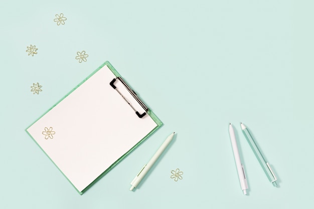 Flat lay with mock-up notebook and stationery for school or office