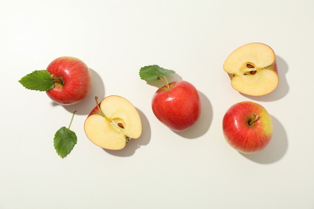 Flat lay with red apples on white table