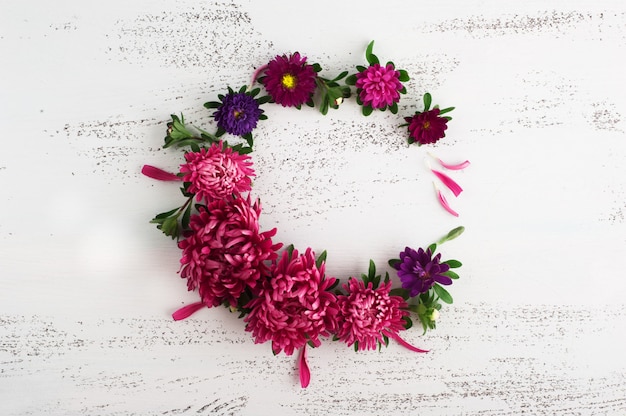 Flat lay with red chrysanthemum