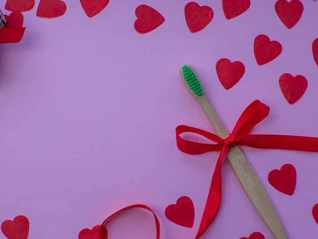 Flat lay with tiny heartshaped papers white gift box and space for text