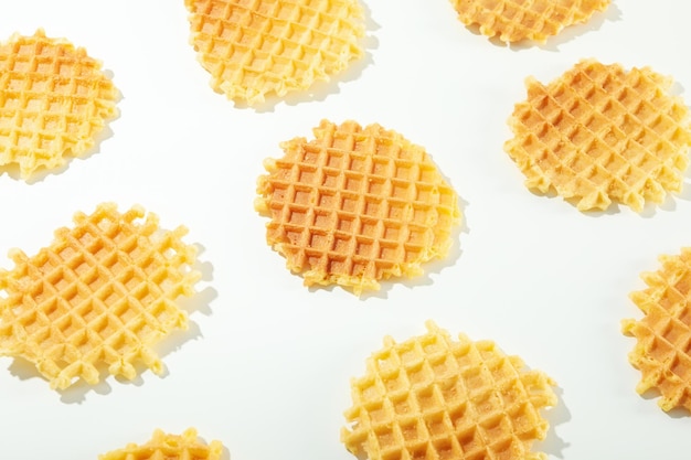 Flat lay with wafer slices on white background