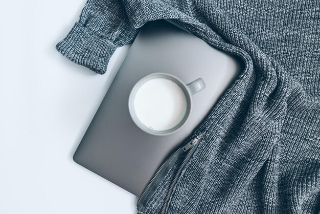 Flat lay with woman staff in gray colors