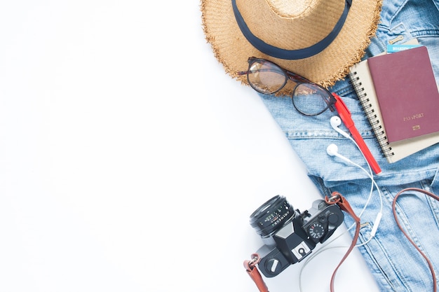 Flat lay of woman traveler items and passport on white background, Travel and Lifestyle concept