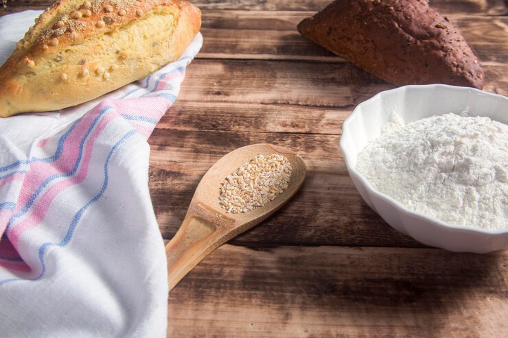 Photo flatlay of freshly baked sourdough bread loaf and bread slices