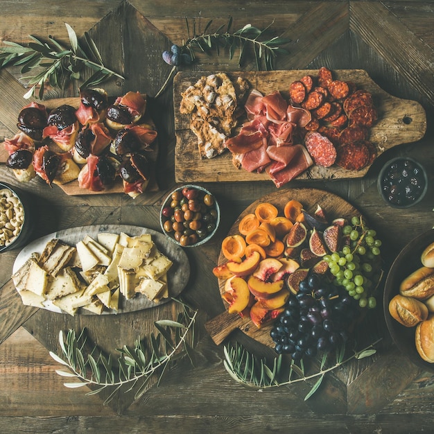 Flatlay of holiday party family dinner table set square crop