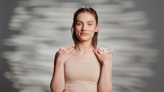 Photo flawless beauty model doing empowering campaign for self love and body positivity, using skincare cosmetics. young beautiful adult feeling positive and confident, advertising tenderness.