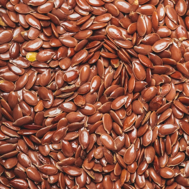 The flax seeds as a background close up