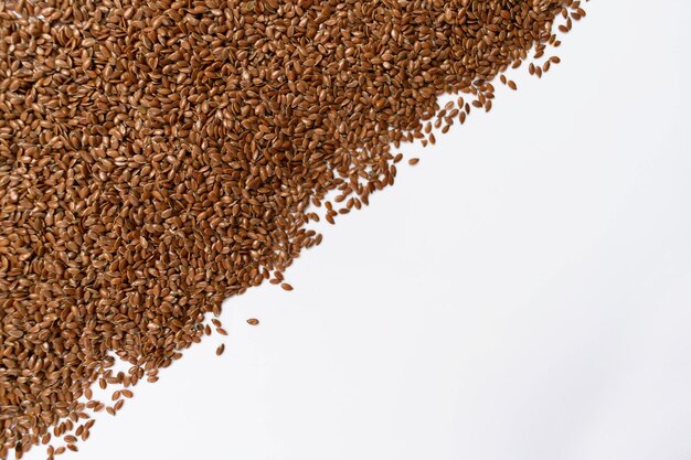 Flax seeds on white backgroundCopy space