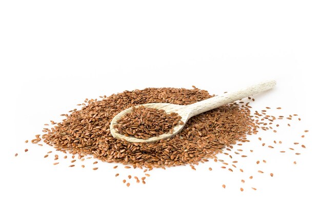 flax seeds in wooden spoon