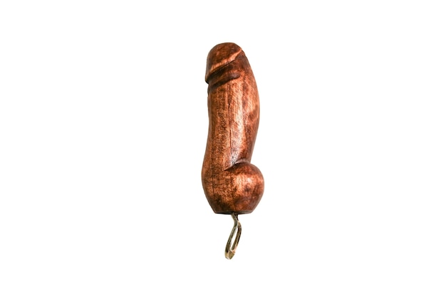 Flesopener in de vorm van houten penis geïsoleerd op een witte achtergrond. souvenir uit landen.