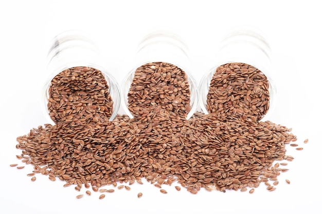 flex seeds on white background. healthy food concept.