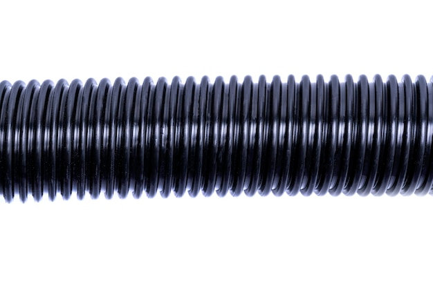 Photo flexible corrugated hose from a vacuum cleaner insulated on a white background