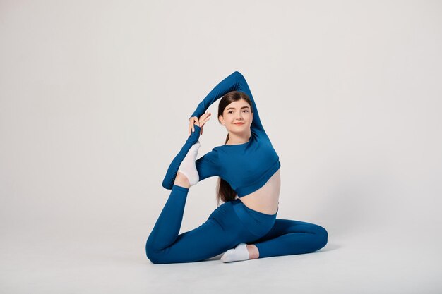 Flexible woman doing stretching