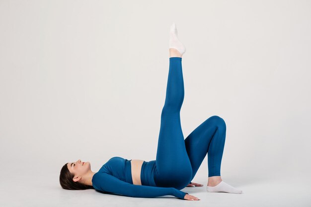 Flexible woman doing stretching