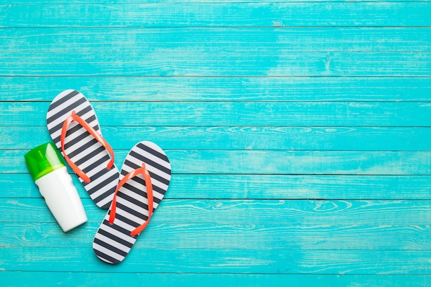 Flip flops on wooden background