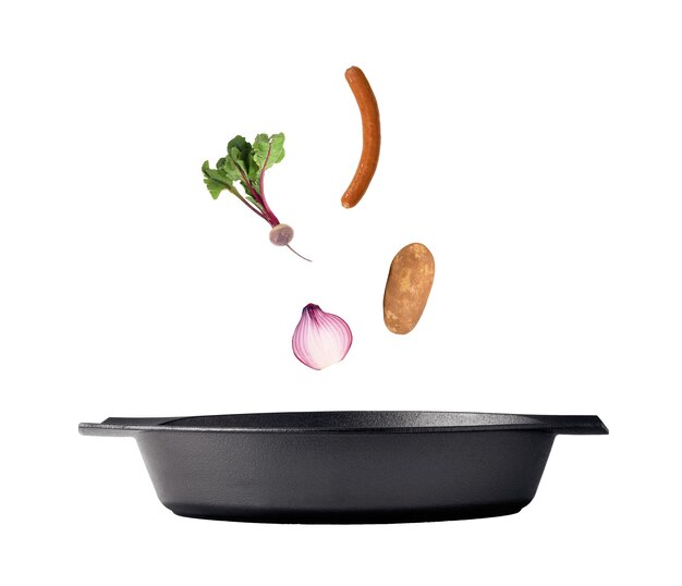 Flipping veggies with pan studio isolated