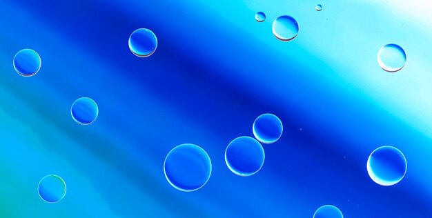 Floating Blue Bubbles in Water