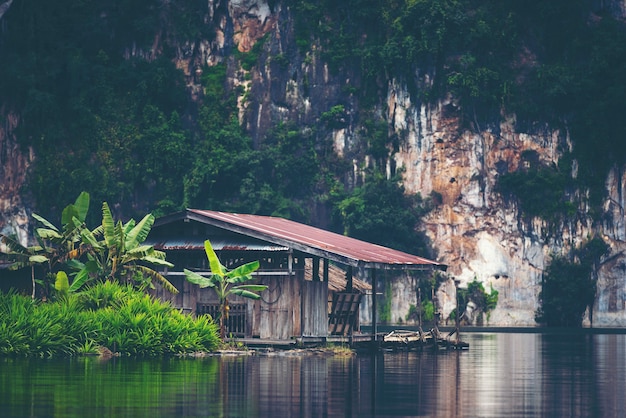 The floating house rafting at the river, landscape Travel concept.