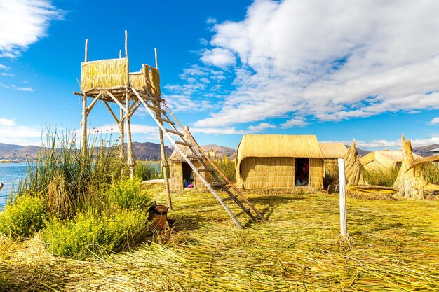 Floating Islands on Lake Titicaca Puno Peru South America Dense root that plants Khili interweave form natural layer about one to two meters thick that support islands