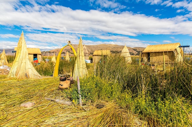 Floating Islands on Lake Titicaca Puno Peru South America Dense root that plants Khili interweave form natural layer about one to two meters thick that support islands