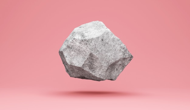 ピンクのスタジオの背景に浮かぶ石