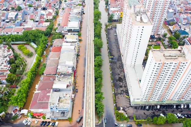 Flood hit apartments and houses nearby in Jakarta