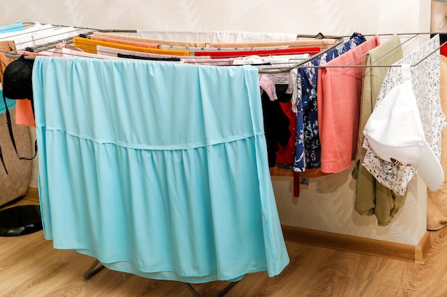 floor dryer with drying clothes in the room