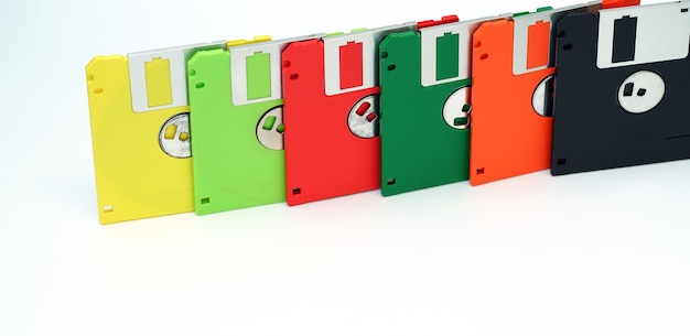 Floppy disk on white background in the different colors