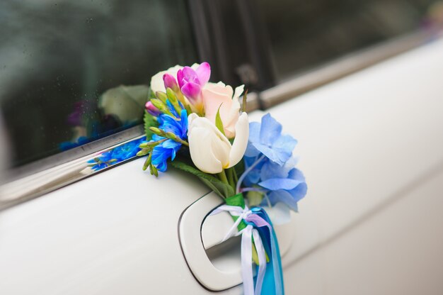 Photo floral arrangement on car handle