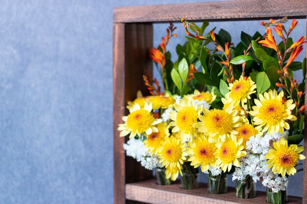 Floral arrangement in wooden box