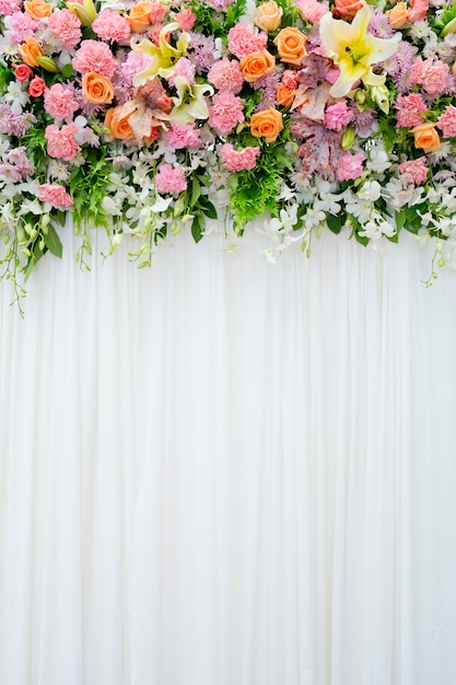 Floral backdrop in cozy room at the wedding