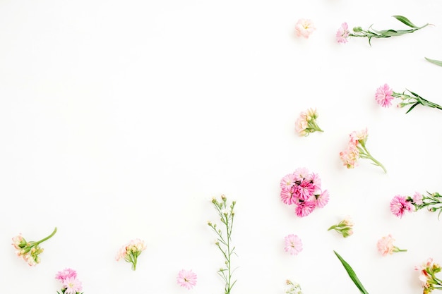 Floral background with pink and beige wildflowers design