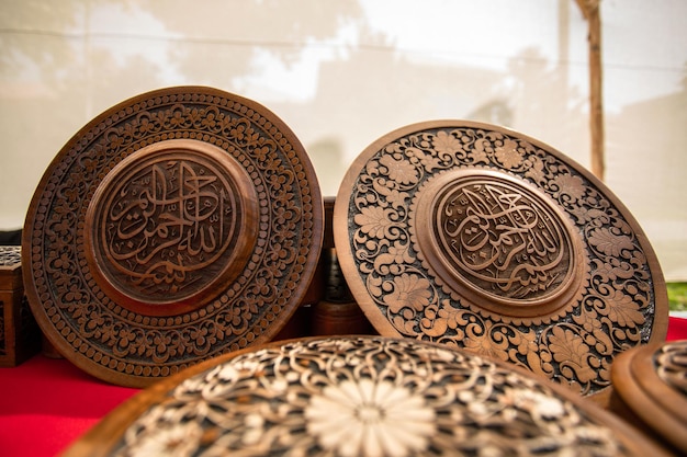 Floral carving with Arabic calligraphy