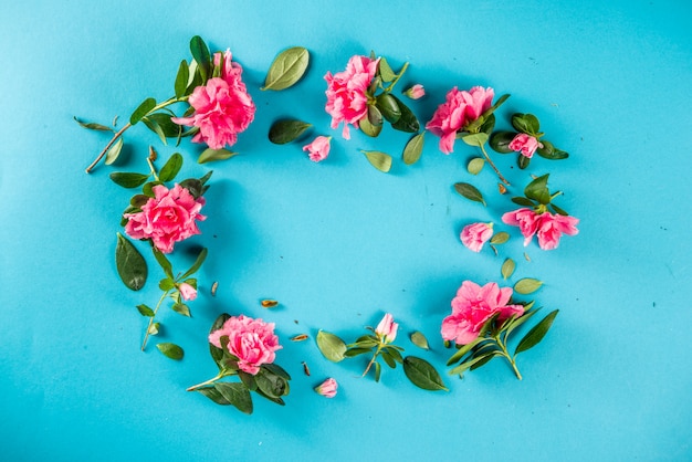 Floral frame with pink spring flowers