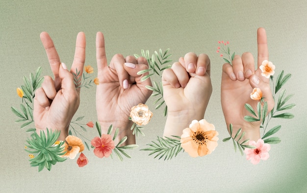 Foto mani floreali che usano il linguaggio dei segni