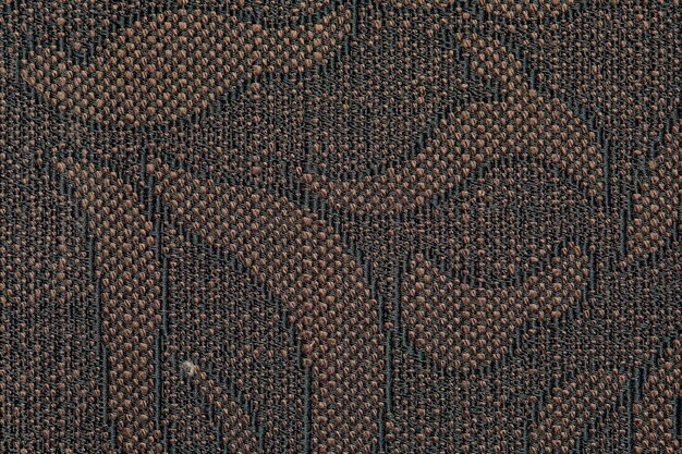 Floral old retro vintage ornament fabric in brown color on\
background cute ornament floral pattern background wall design\
vintage wallpaper