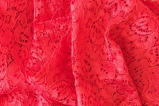 Floral red lace fabric textured backdrop