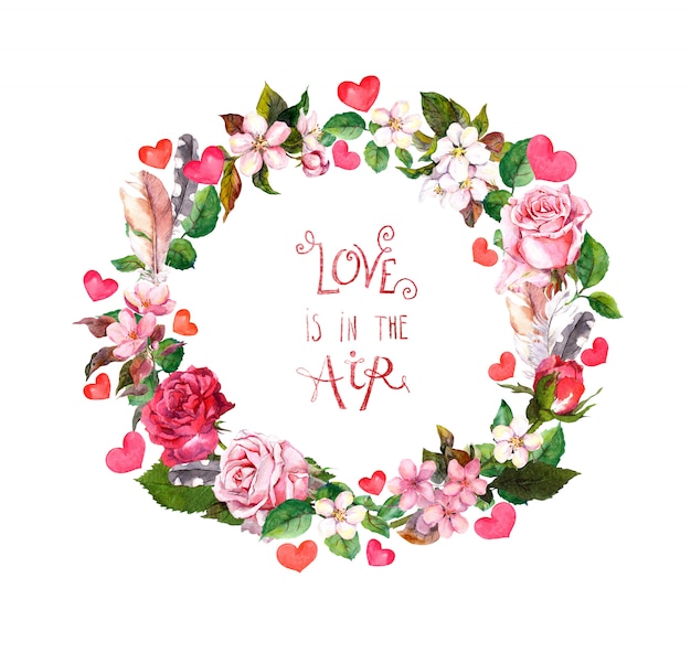 Floral wreath with roses flowers and cherry blossom, feathers, pink hearts. Watercolor round border for Valentine day, wedding with text quote "Love is in the air"