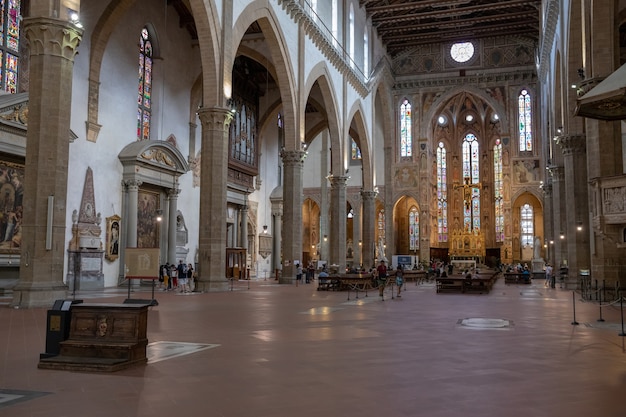 Florence, Italy - June 24, 2018: Panoramic view of interior of Basilica di Santa Croce (Basilica of the Holy Cross) is Franciscan church in Florence and minor basilica of Roman Catholic Church