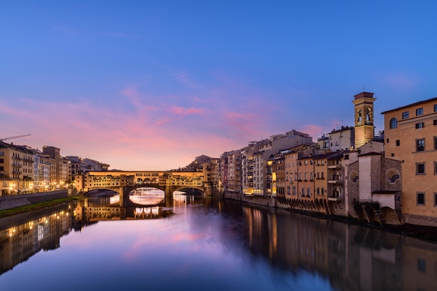 Florence Italy at the Ponte Vecchio Bridge crossing the Arno River