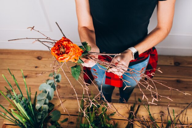 Florist girl makes a bouquet. Florist Workflow.