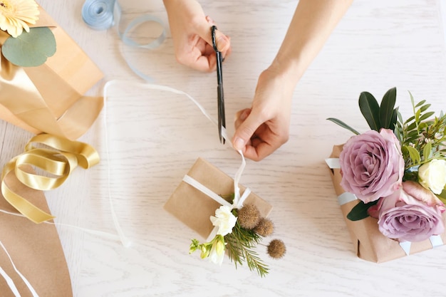 Florist making beautiful composition with flowers