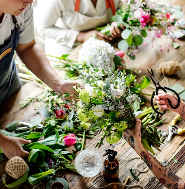 Florist Making Fresh Flowers Bouquet Arrangement