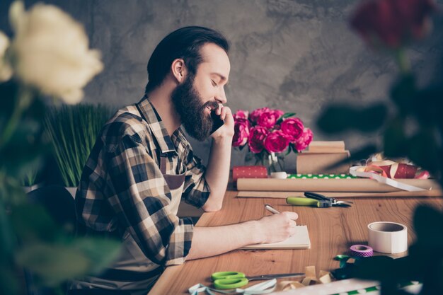 Florist posing in his flower shop