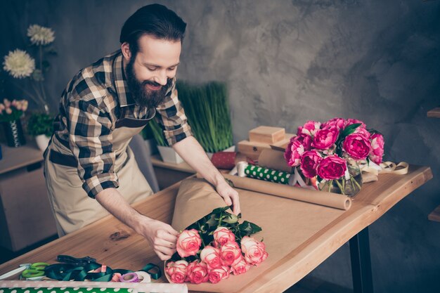 Florist posing in his flower shop